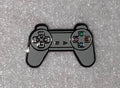 PlayStation controller pin